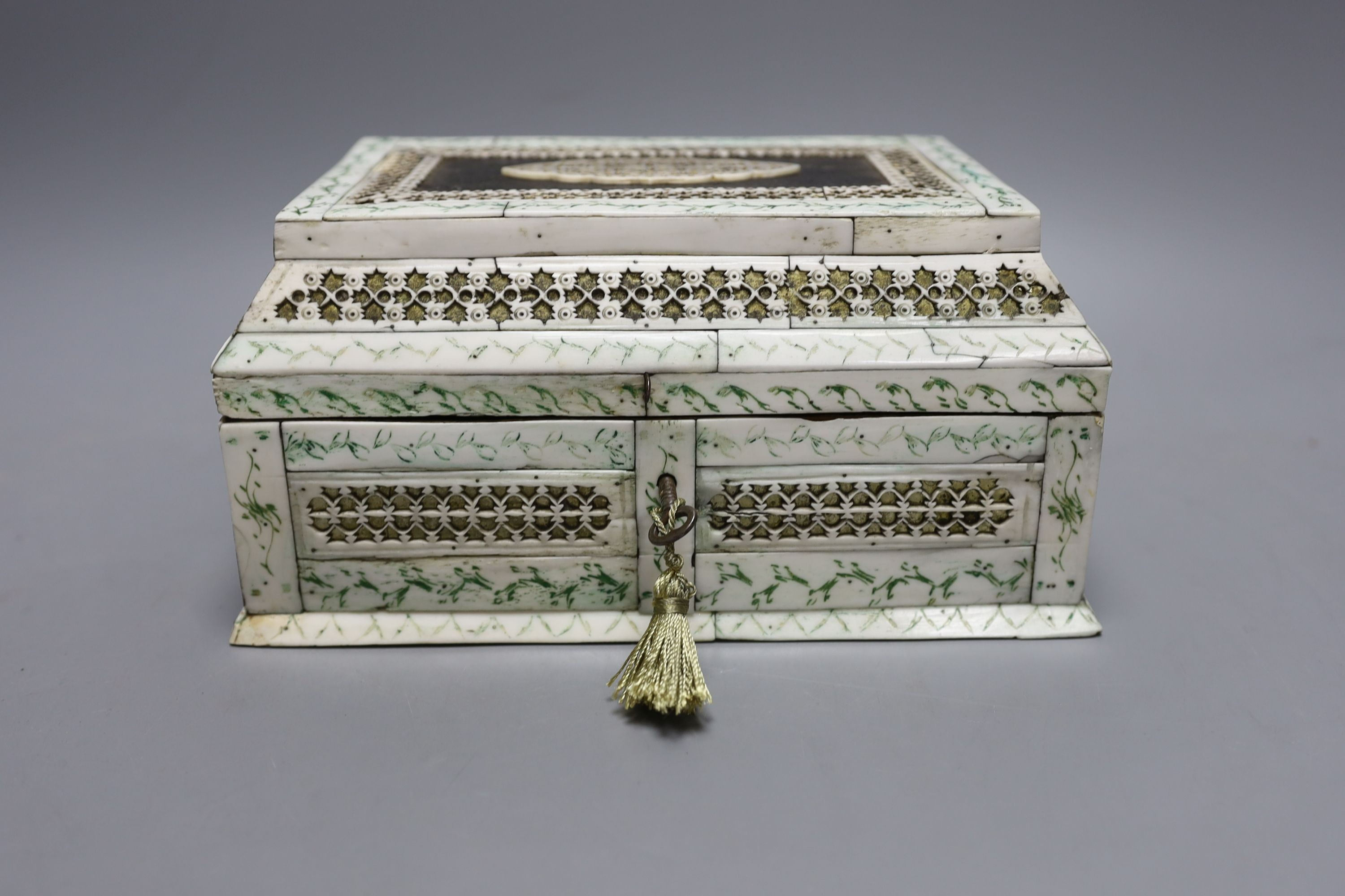 A 19th century Indian bone and ivory veneered sewing casket - 12cm tall